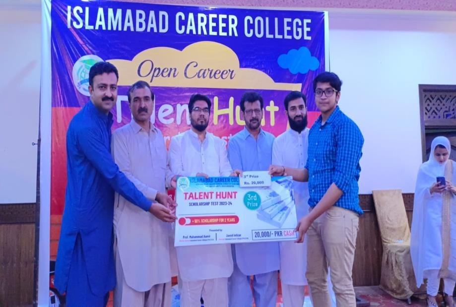 An ICC faculty member with students